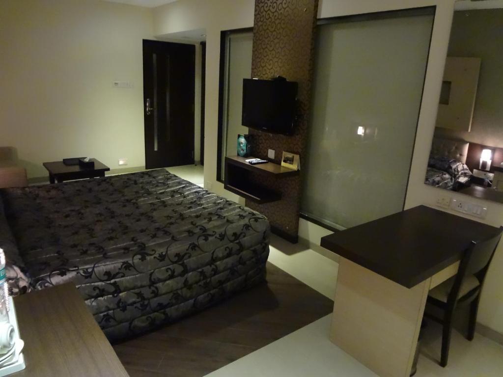 Hotel Capitol Thane Quarto foto